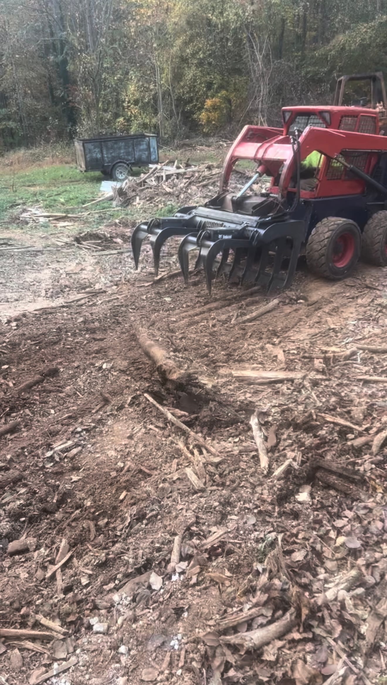 Heavy machinery working a tree job